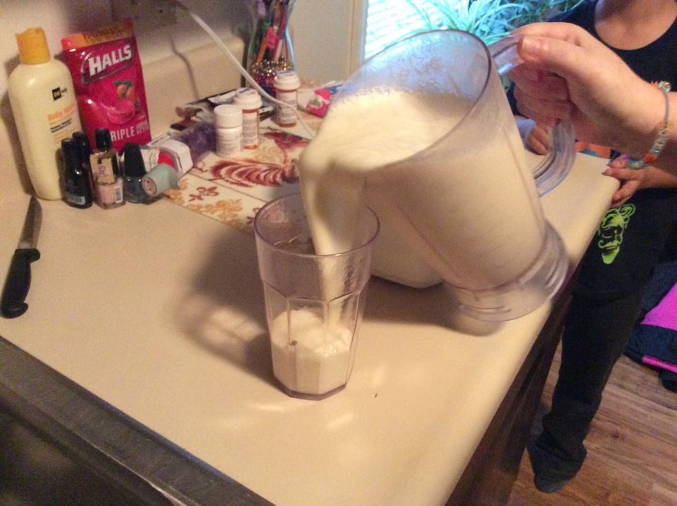 Pour banana smoothie into a cup