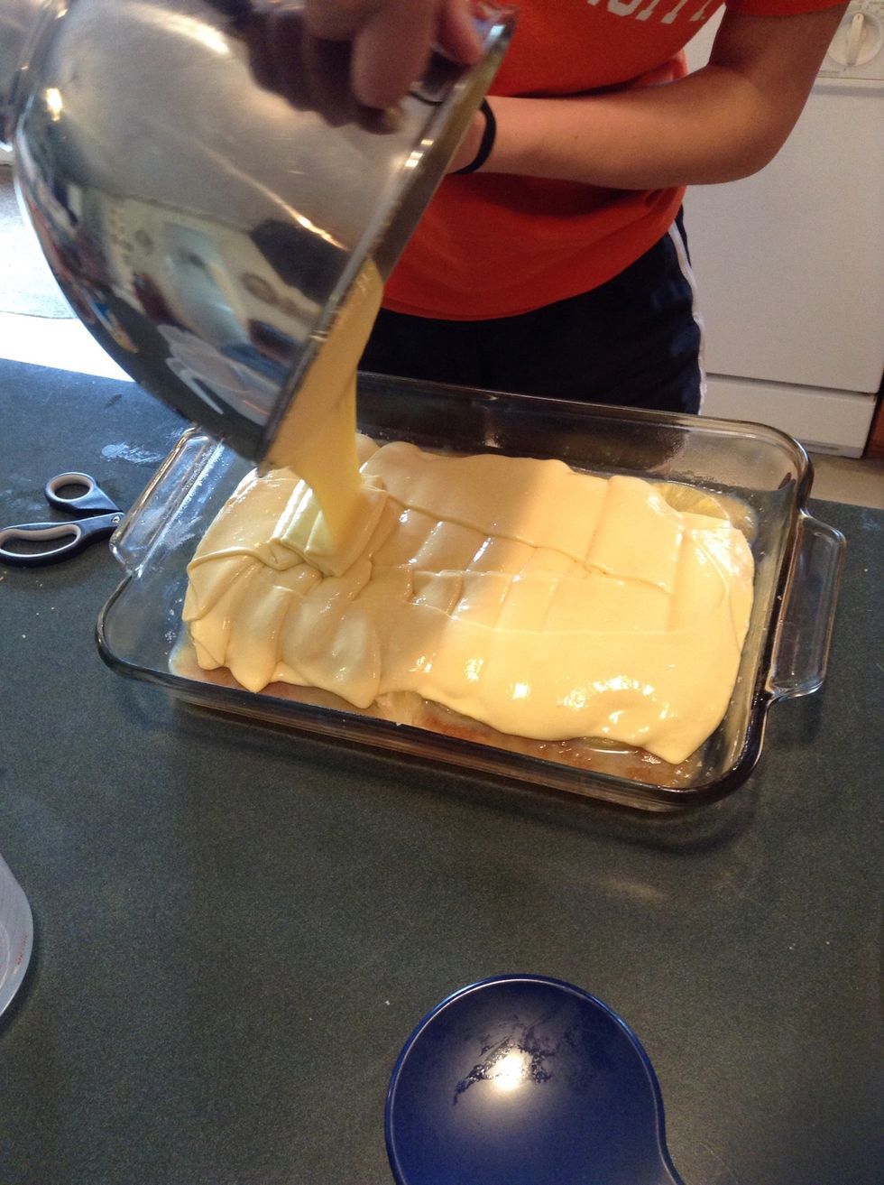 Pour batter evenly over the fruit