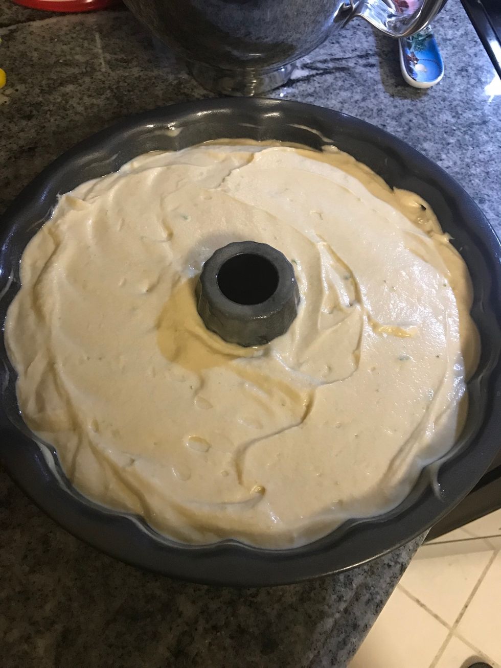 Pour batter in to the pan and bake it for about 1 hour and 20 minutes or until you can stick a knife in it and it comes out clean.