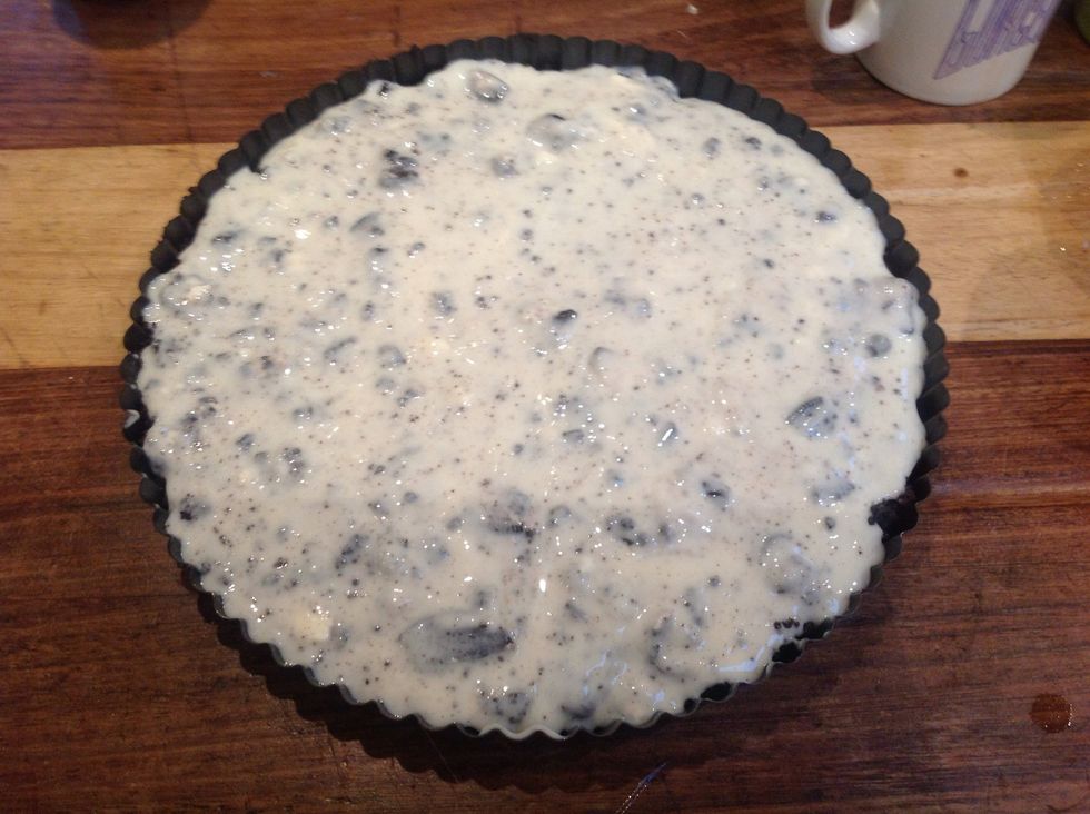 Pour batter into cake tin on top of crust