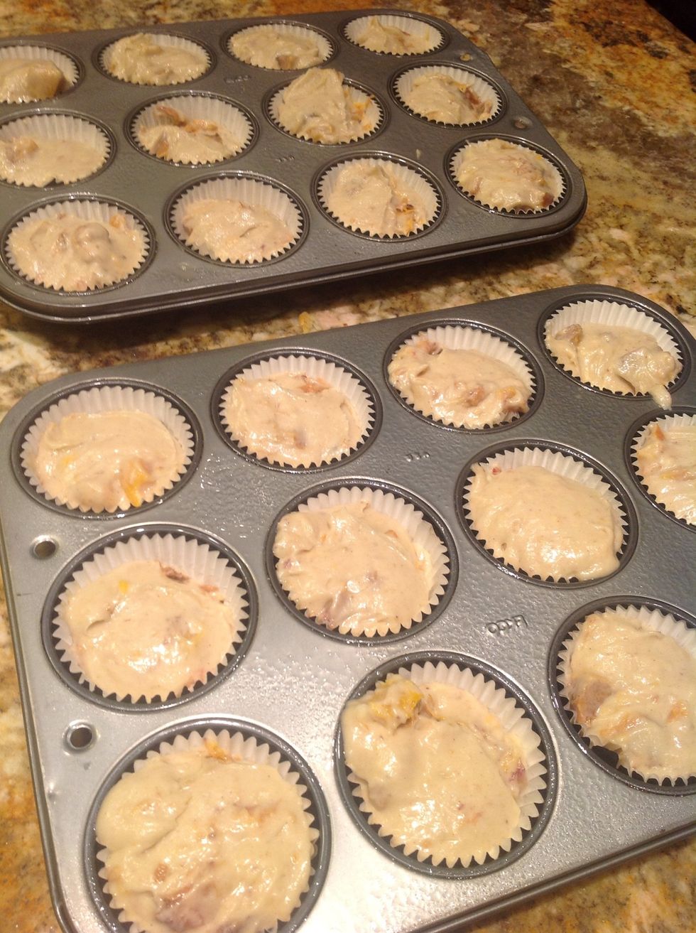 Pour batter into individual baking cups and cook at 325F (163C) for 10 min