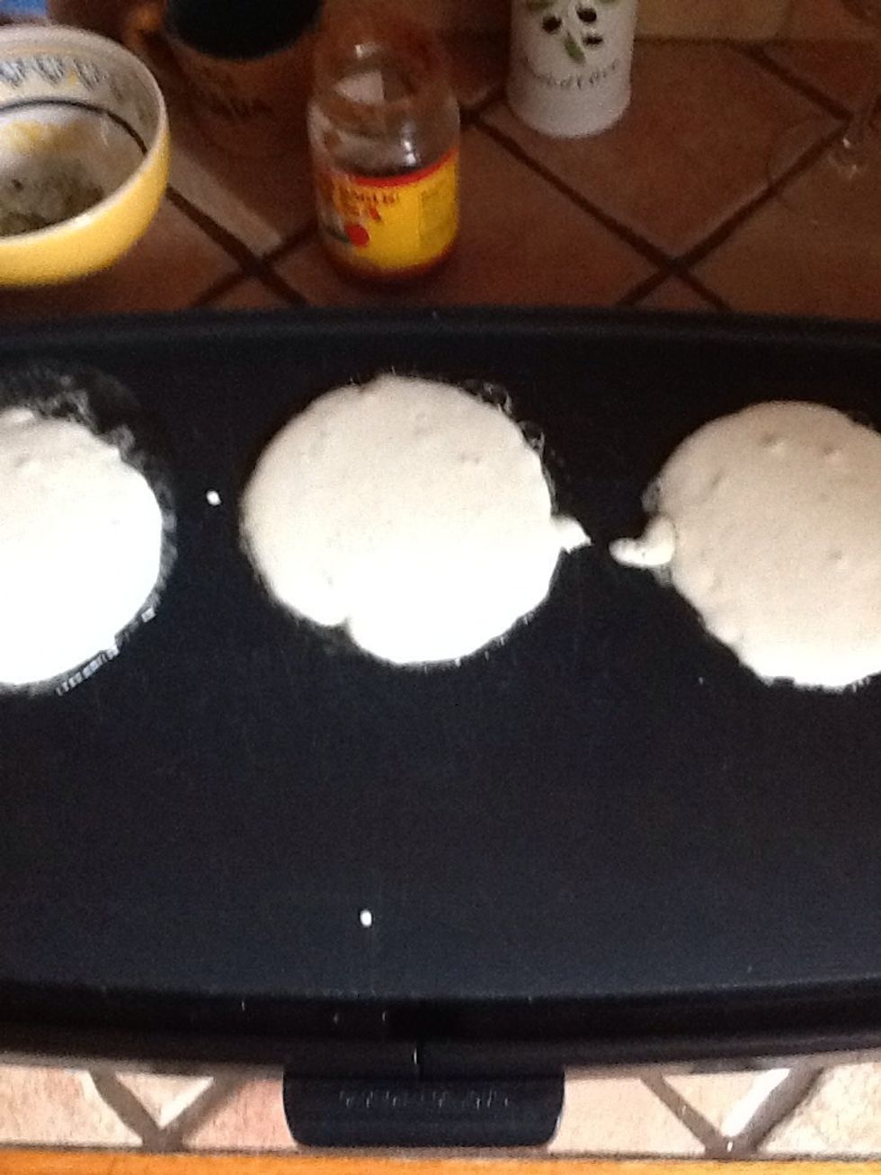 Pour batter onto griddle.