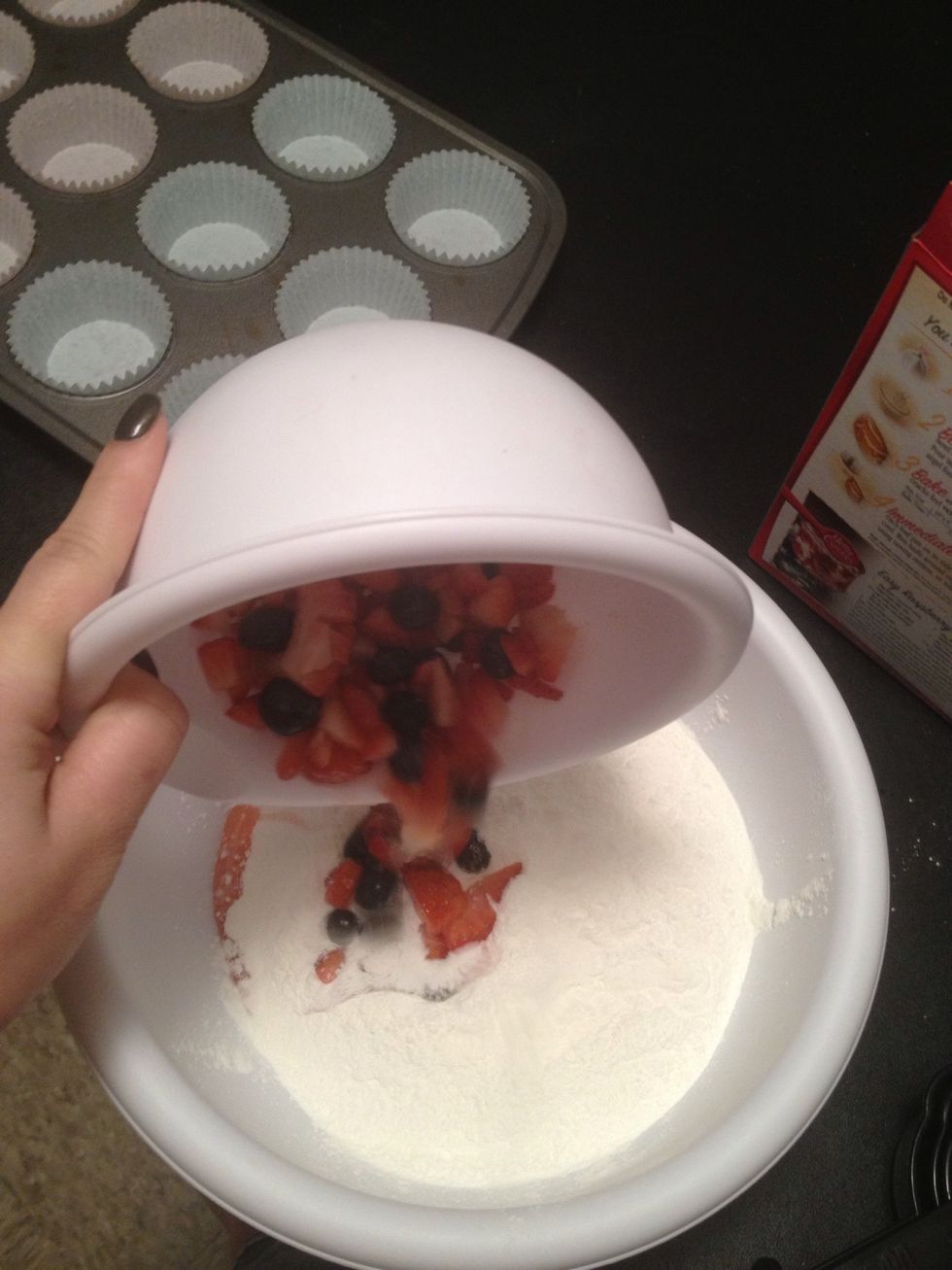 Pour berries into bowl. I definitely snacked on some before pouring it in.