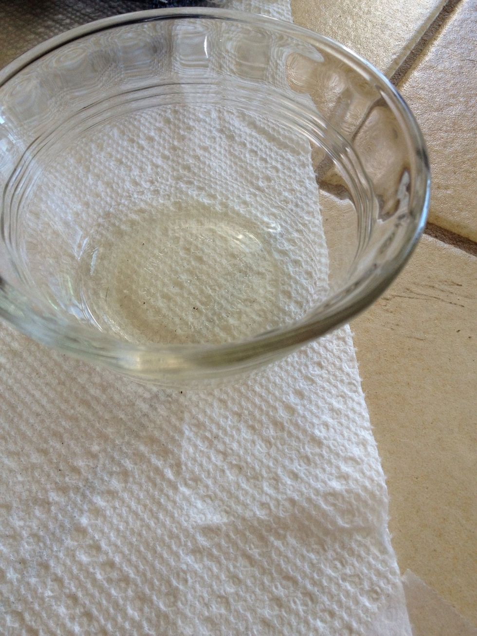 pour bleach into container (straight bleach. Don't try to delude it. It won't show up). You may have to pour a lot.