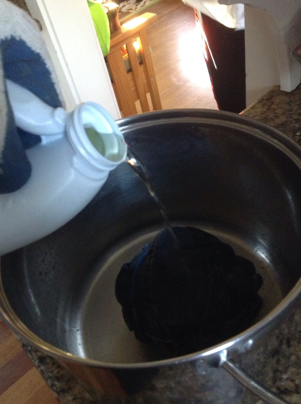 Pour bleach. (Wear gloves bleach is very bad for skin)