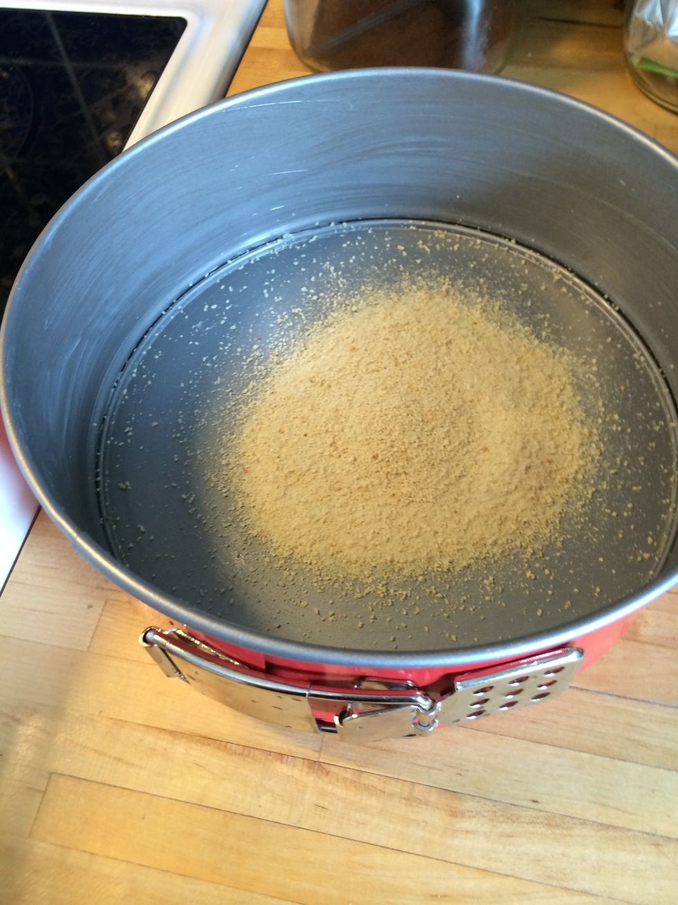 Pour breadcrumbs in the dish.