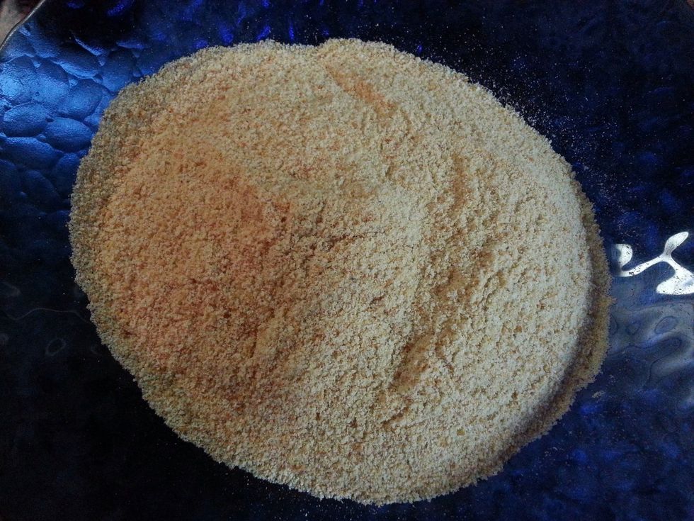 Pour breadcumbs in a bowl