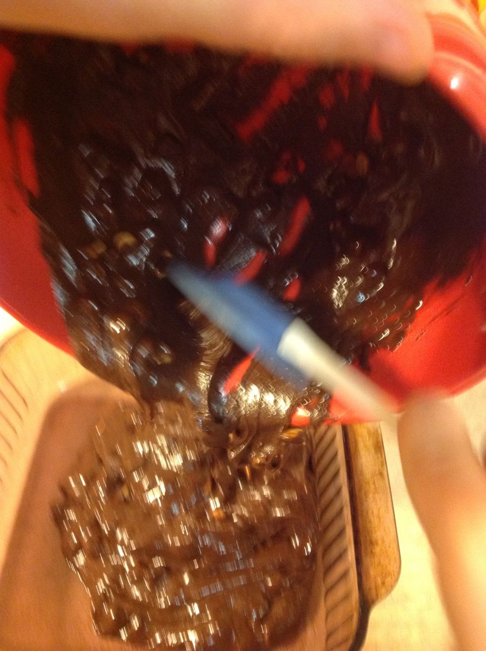 Pour brownie mix into 9"x9" baking pan.