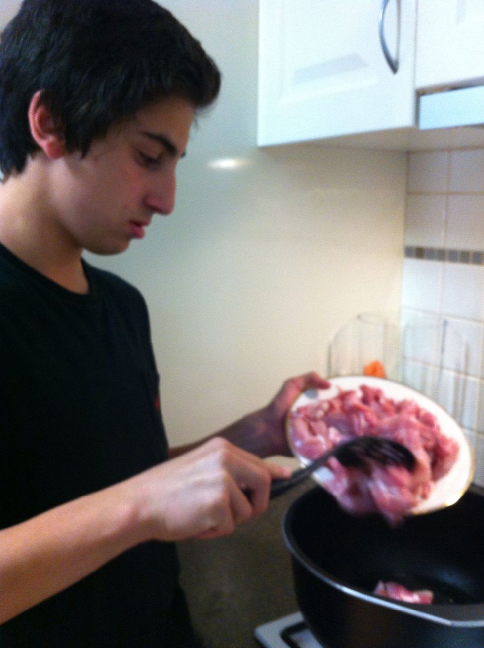 Pour chicken in and stir