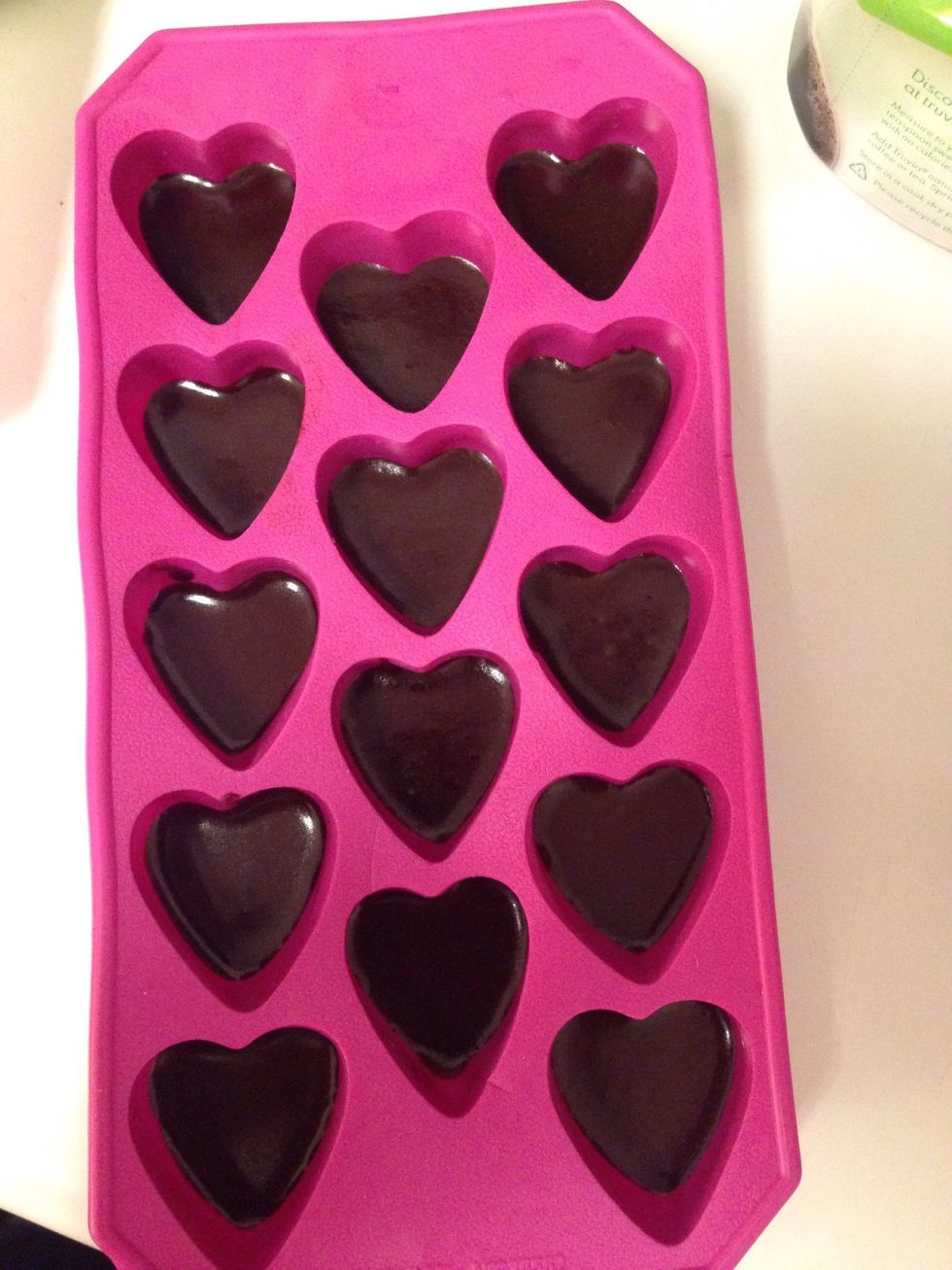 Pour chocolate evenly into your mold, and place in freezer until slightly firm.