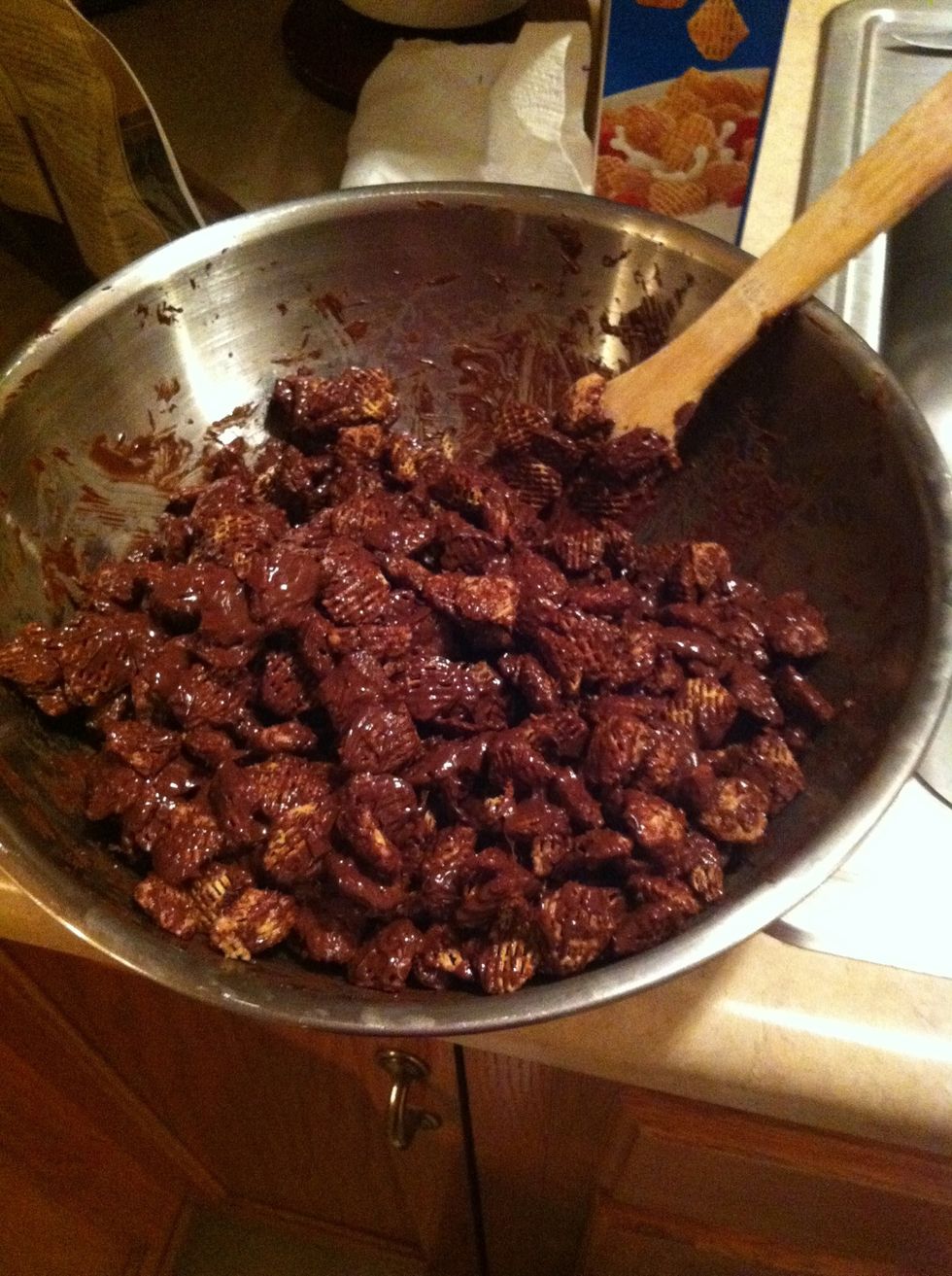 Pour chocolate mixture over crispix and coat evenly.