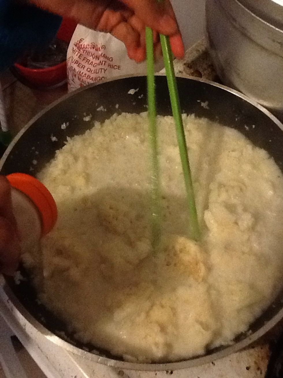Pour coconut milk into the pan and mix them together....