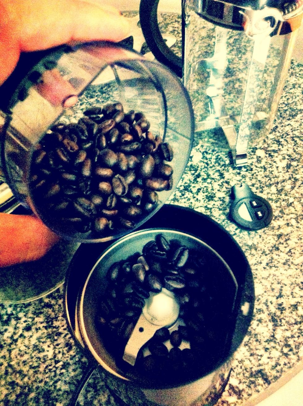 Pour Coffee beans into the grinder!