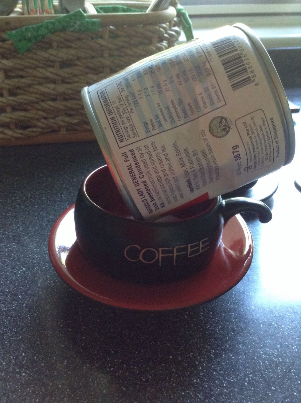 Pour condensed milk directly into the cup. Mine was cold from the fridge so I had to let it sit on top of the cup until I get the desired amount.