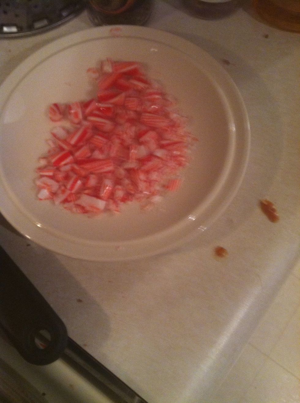 Pour crushed candy canes onto small plate.