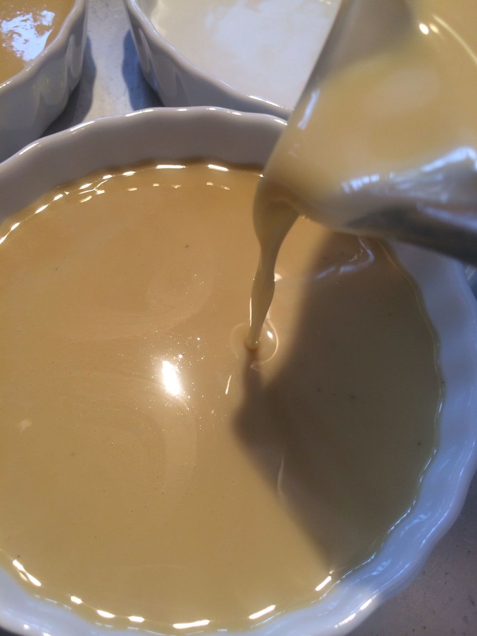 Pour custard evenly between the 4 custard dishes.
