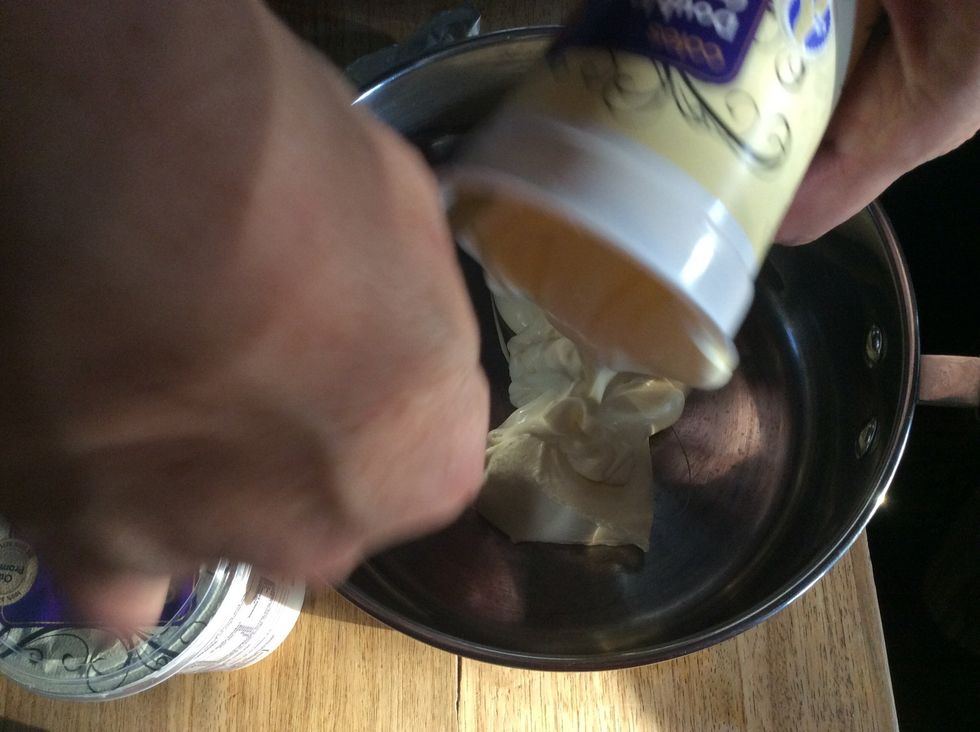 Pour double cream into the medium saucepan