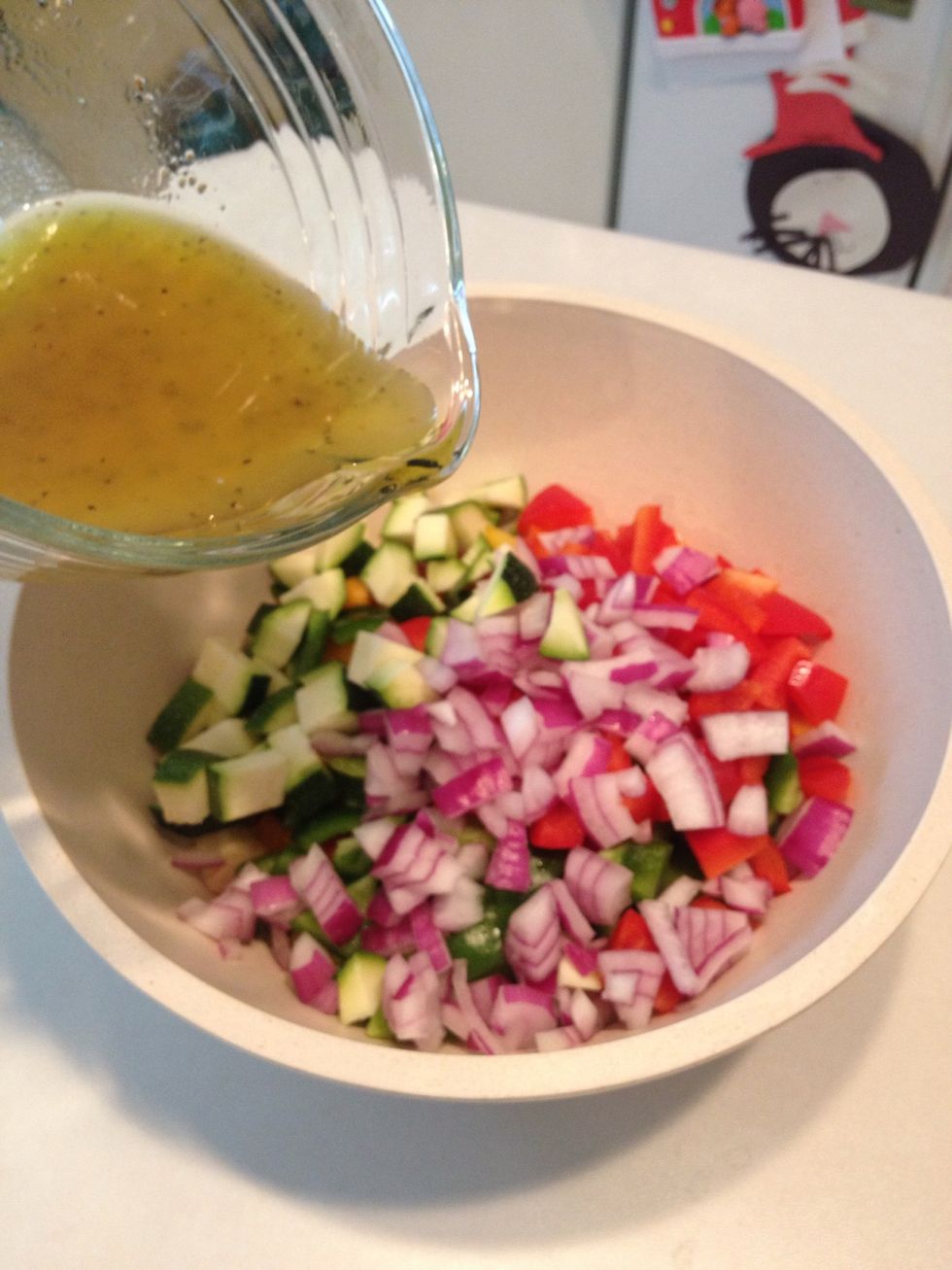 Pour dressing over veggies.