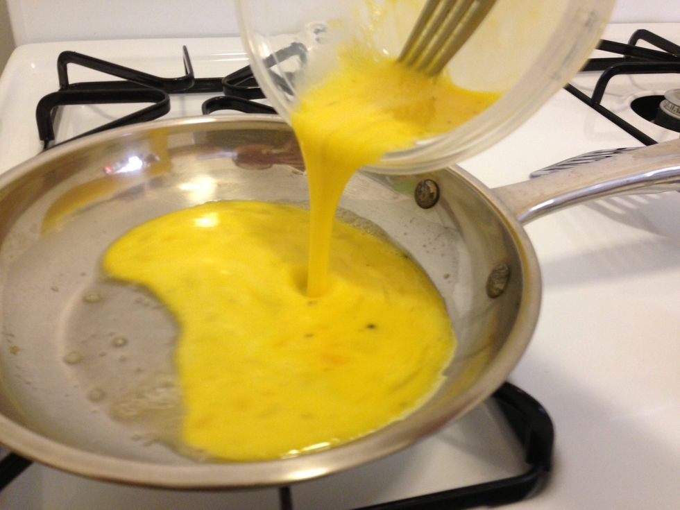 Pour egg mixture into pan