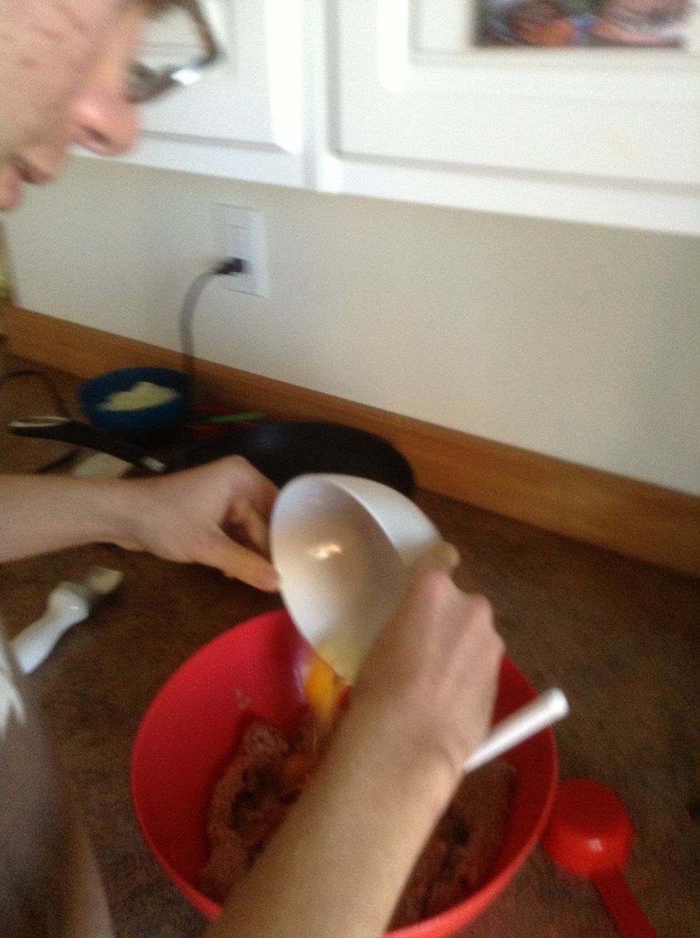 Pour eggs into bowl with the meat.