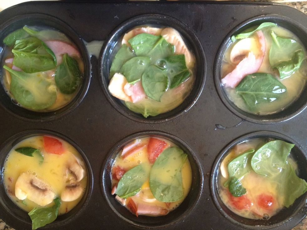 Pour eggs into cups, This is how it should look. Put in oven at 350 degrees bake for 15-20 min or until cooked.