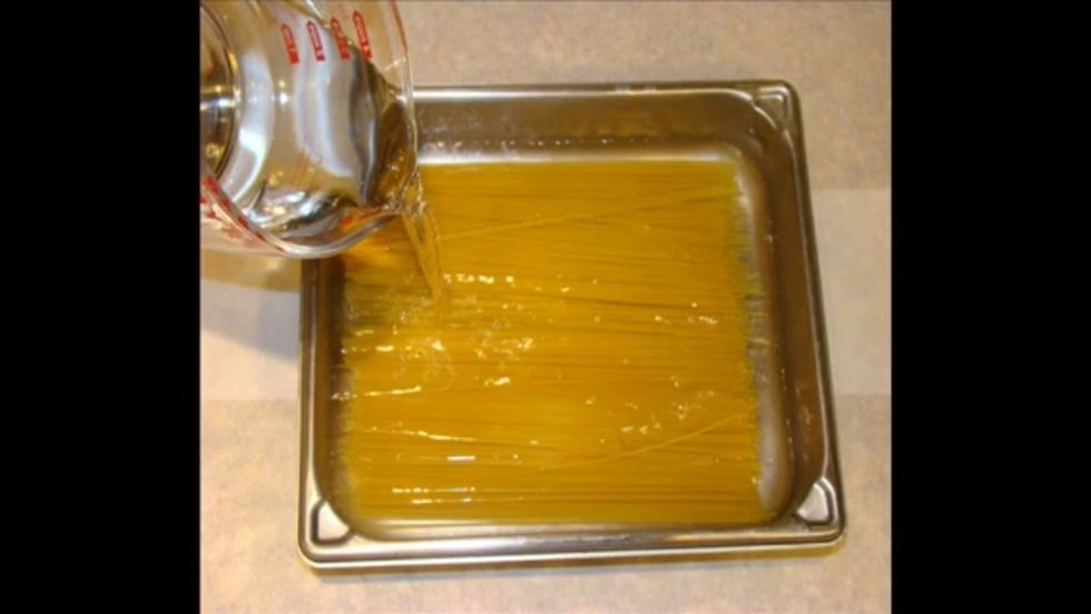 Pour enough water over the pasta to cover it by about a half inch.