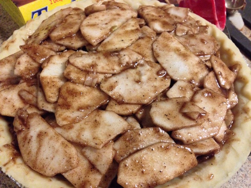 Pour entire apple filling into your deep dish pie shell. Yes it will look like a lot but apple pie expands before it descends so it will look like its over flowing. Don't worry cram it all in there!
