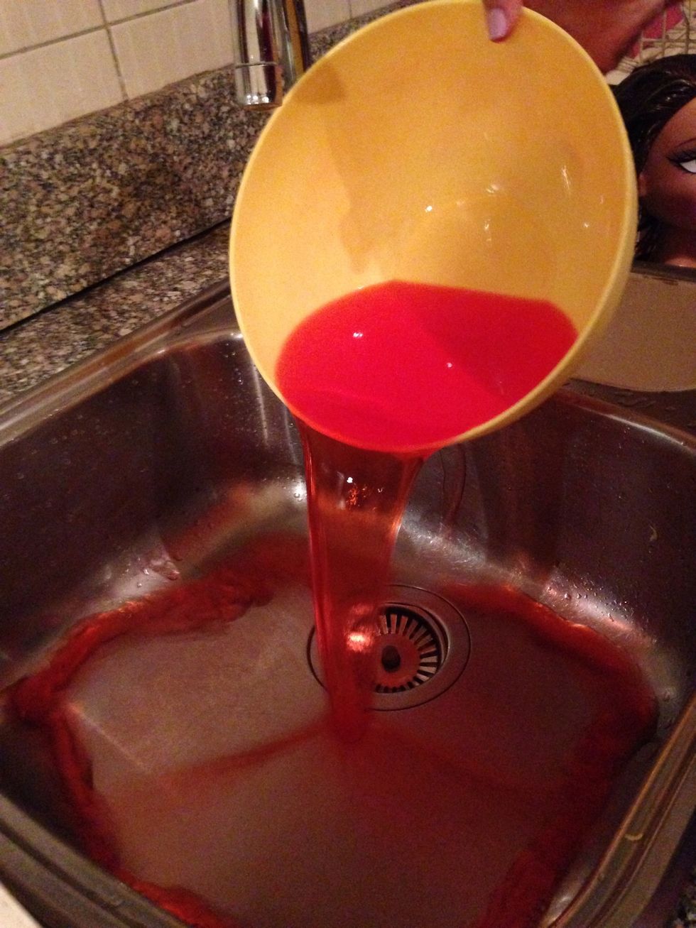 Pour extra kool aid out