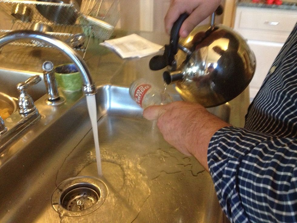 Pour faster as the glass heats up. The point is to get the glass hot then shock it so it goes under stress and breaks.