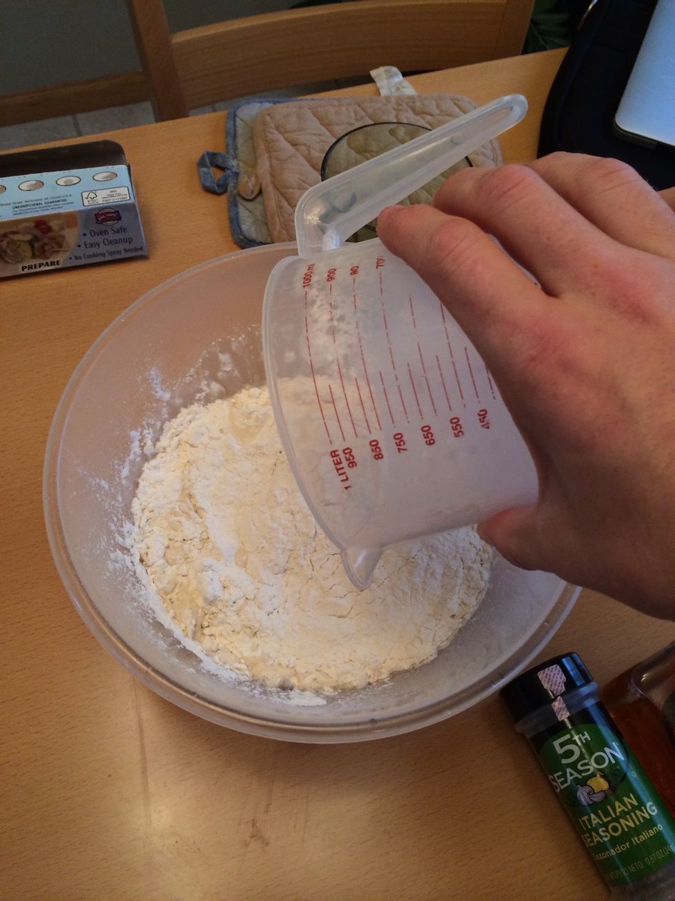 Pour flour in. Add honey and or seasoning if you wish. Stir with spoon