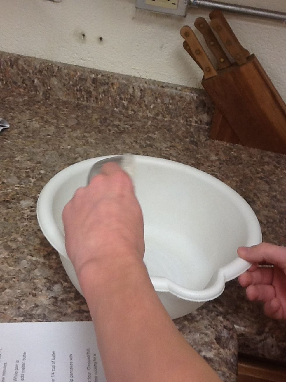 Pour flour into bowl