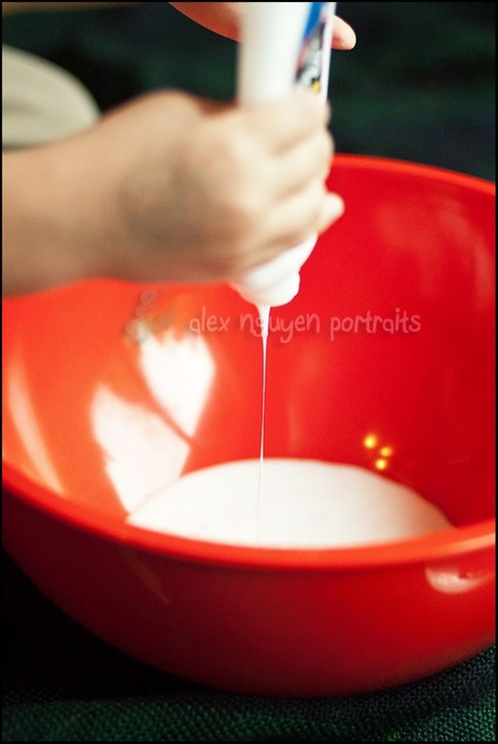 Pour glue into water