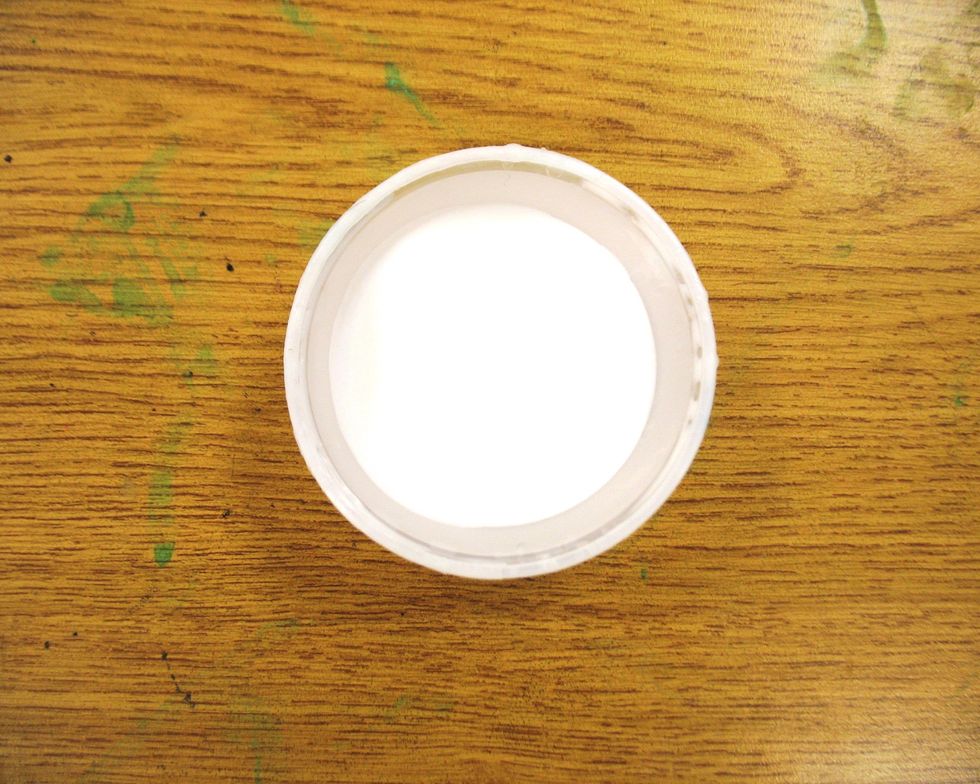 Pour glue straight from the bottle into a plastic cup and mix in a little water to make it easily spreadable with a paintbrush.
