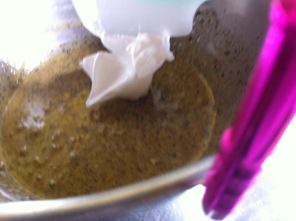 Pour gradually over egg whites, folding in with rubber spatula.