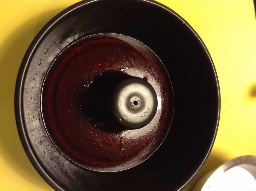 Pour HALF of it into the cake pan