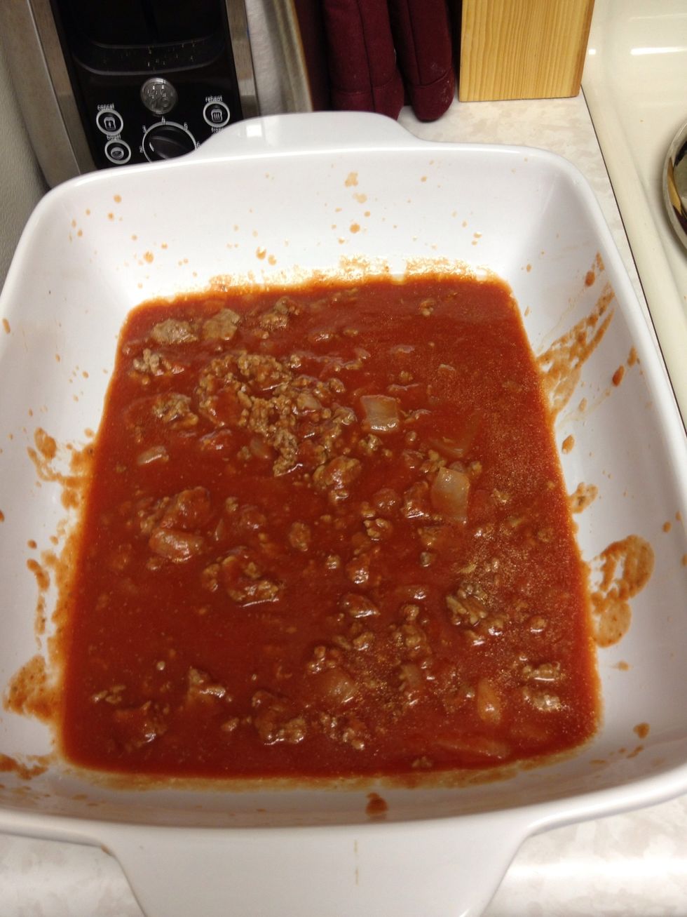 Pour half of the sauce mixture in the bottom if a casserole pan (9x13-ish pan).