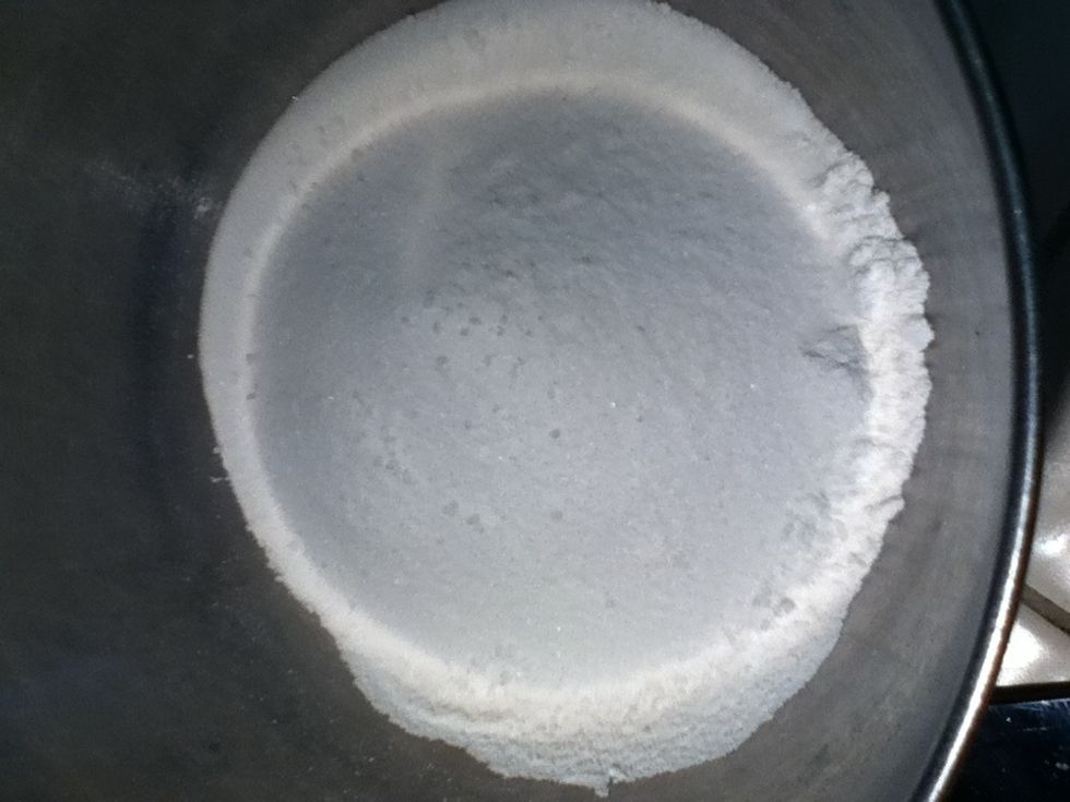 Pour HALF of the sugar in with the flour.