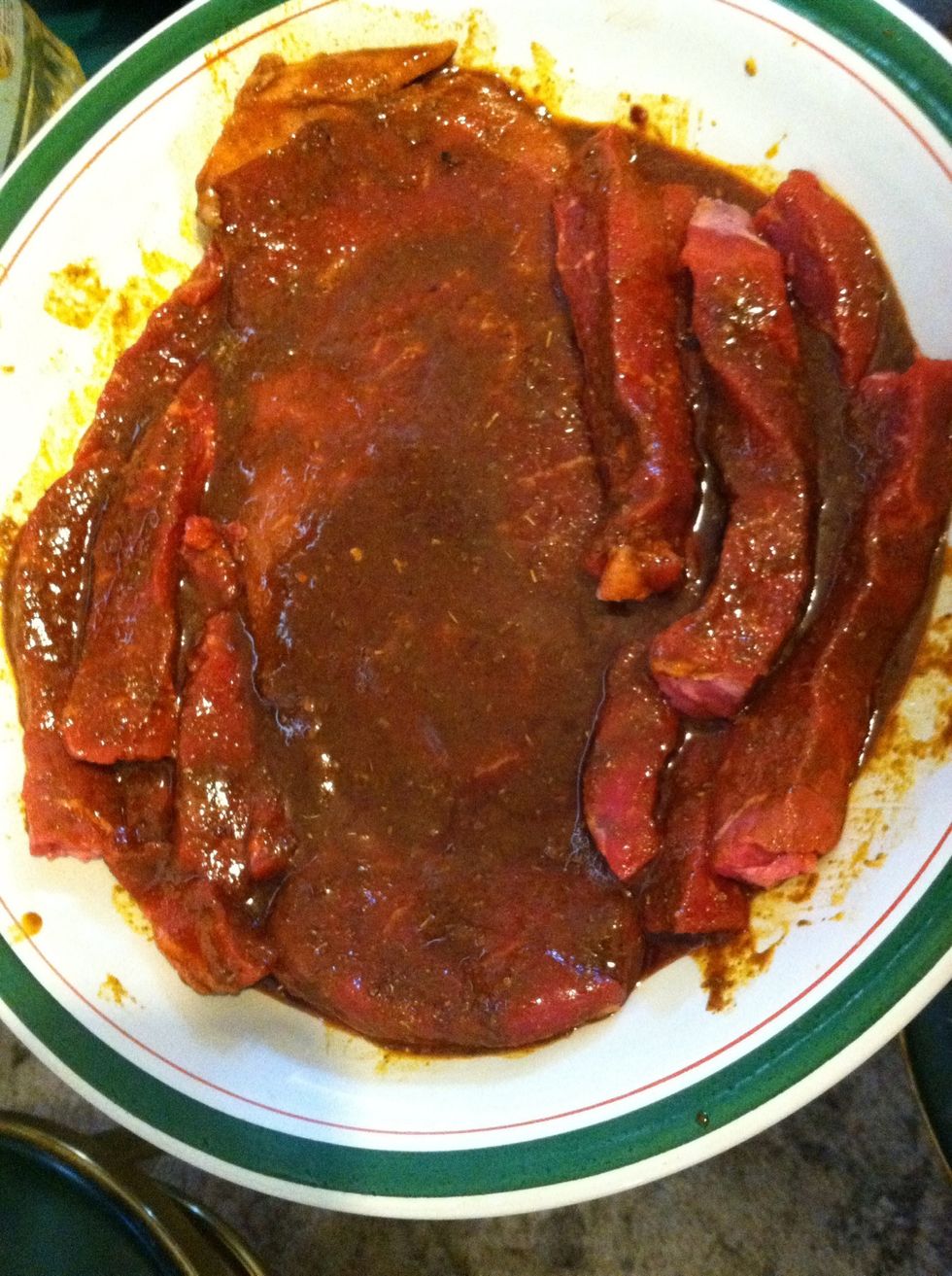Pour half the sauce into a bowl then place meat into the bowl. Poor rest of sauce over meat. (I had another steak so I marinated it with the rest;)) let sit for 4 hours or overnight in the fridge