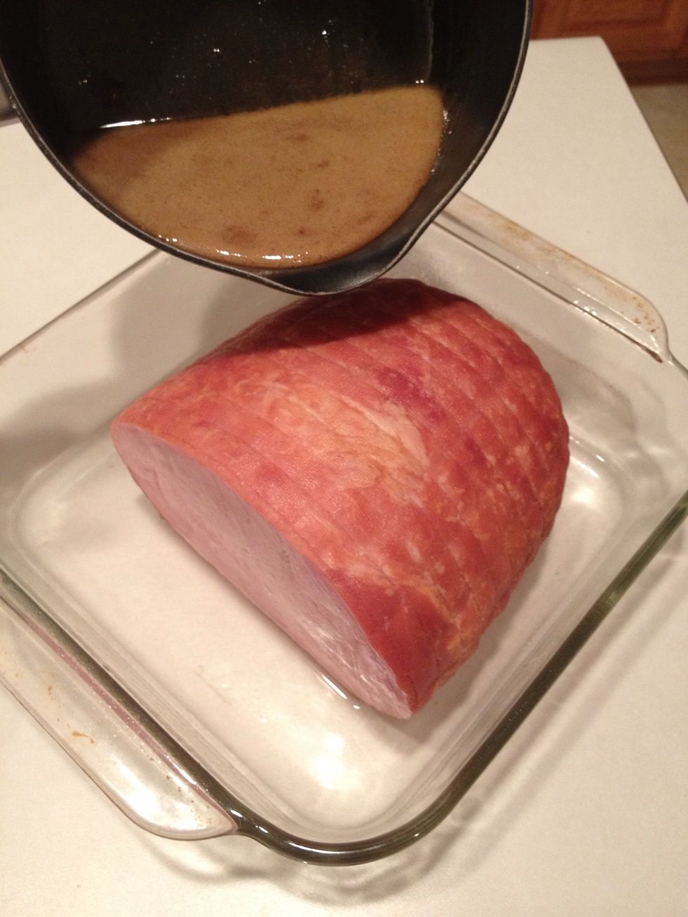 Pour heated sauce over ham.