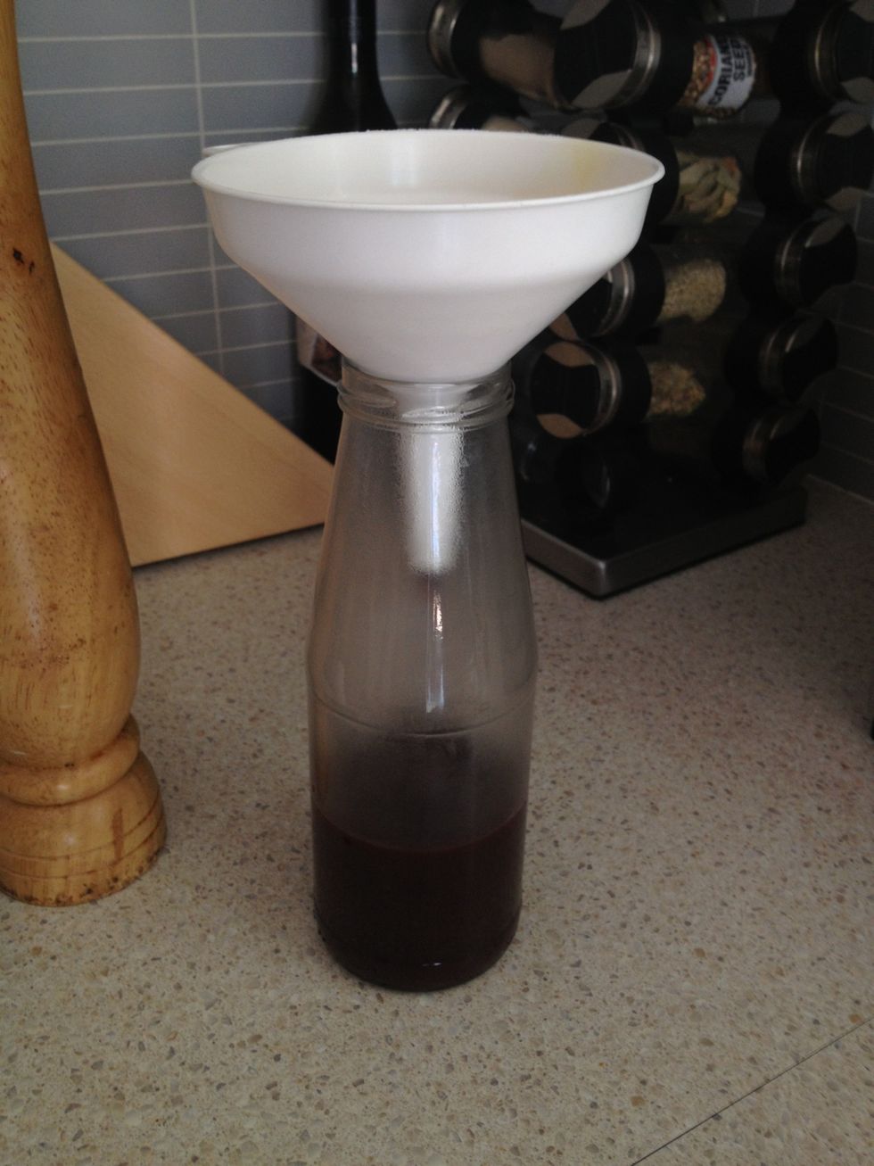 Pour hot sauce into prepared jar. I use a funnel to avoid too much mess.
