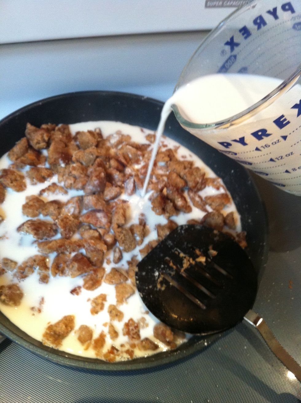 Pour in 2 cups milk.