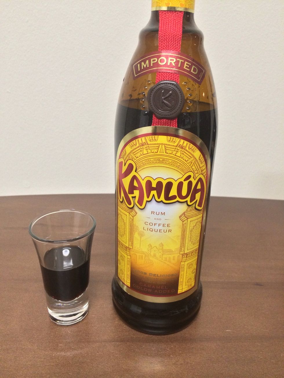 Pour in 2 ounces of Kahl\u00faa into your shot glass.