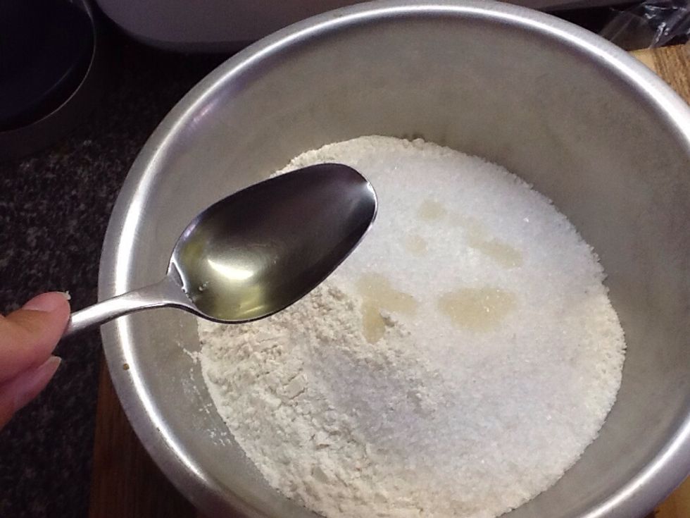 Pour in 2 tablespoons of cooking oil.