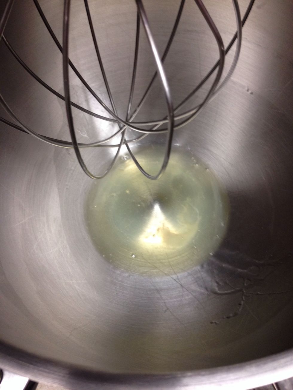 Pour in 50 grams of egg whites and mix on high for thirty seconds until the eggs start to get frothy