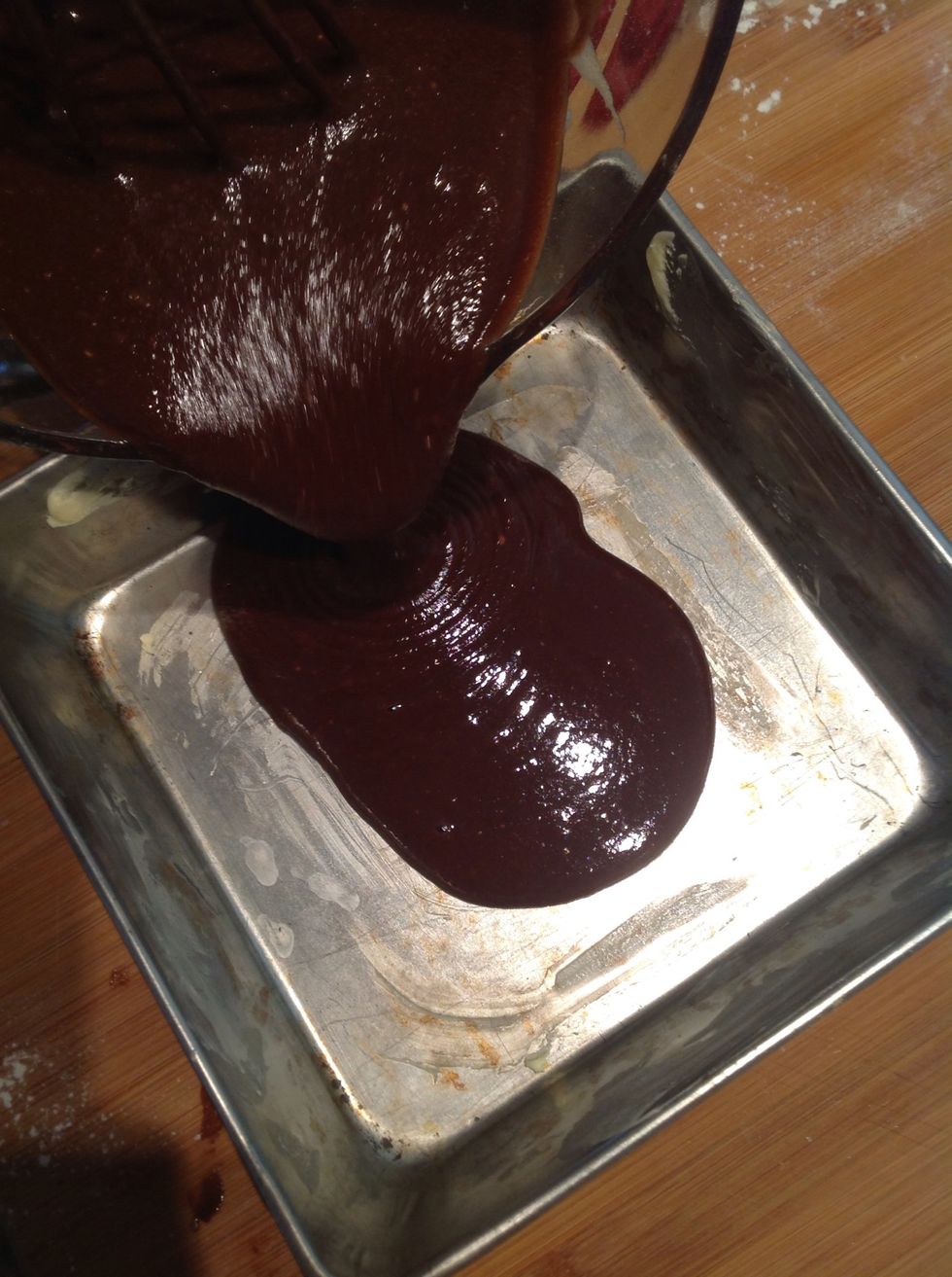 Pour in a buttered cake pan