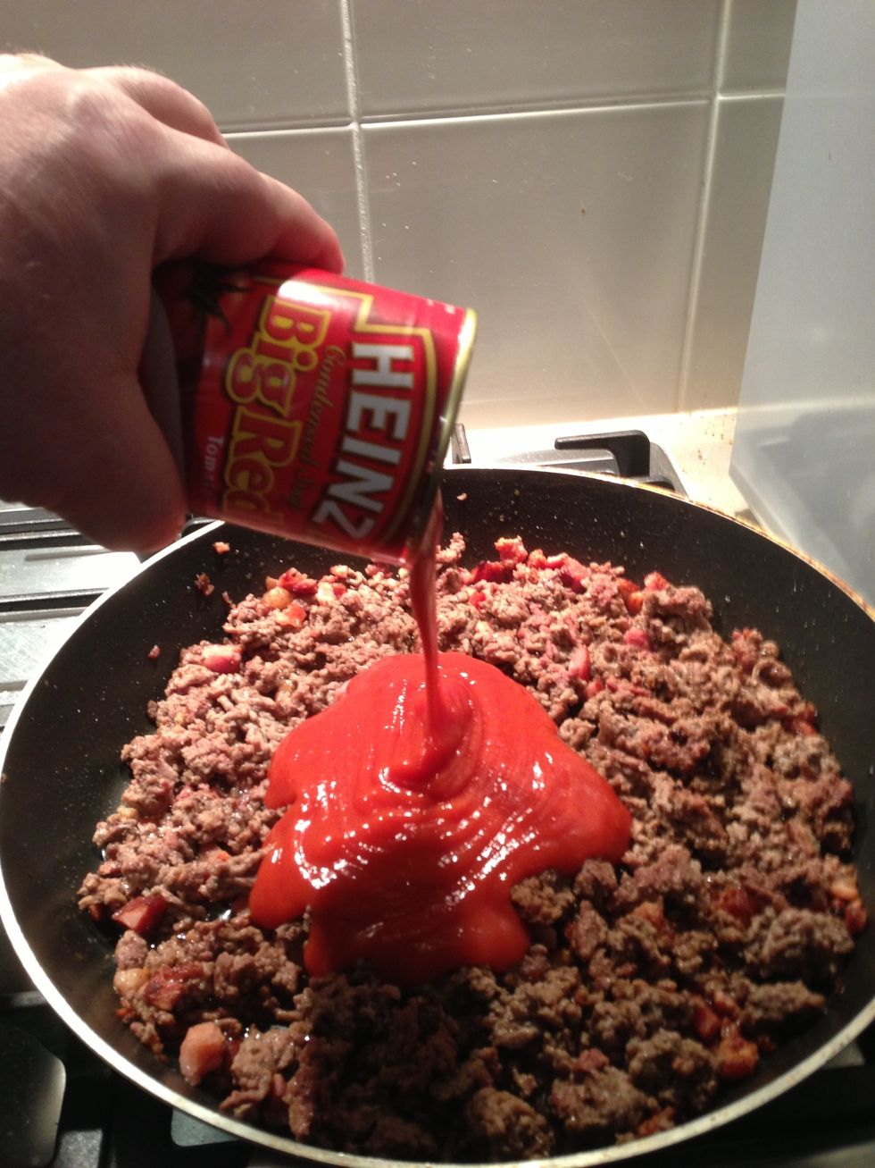Pour in a can of condensed tomato soup, make sure it is condensed soup