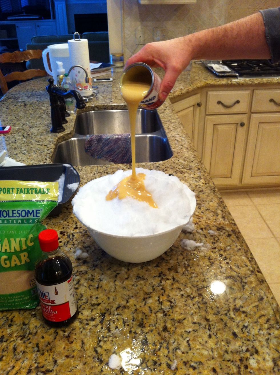 Pour in a can of sweetened condensed milk, 14 oz.