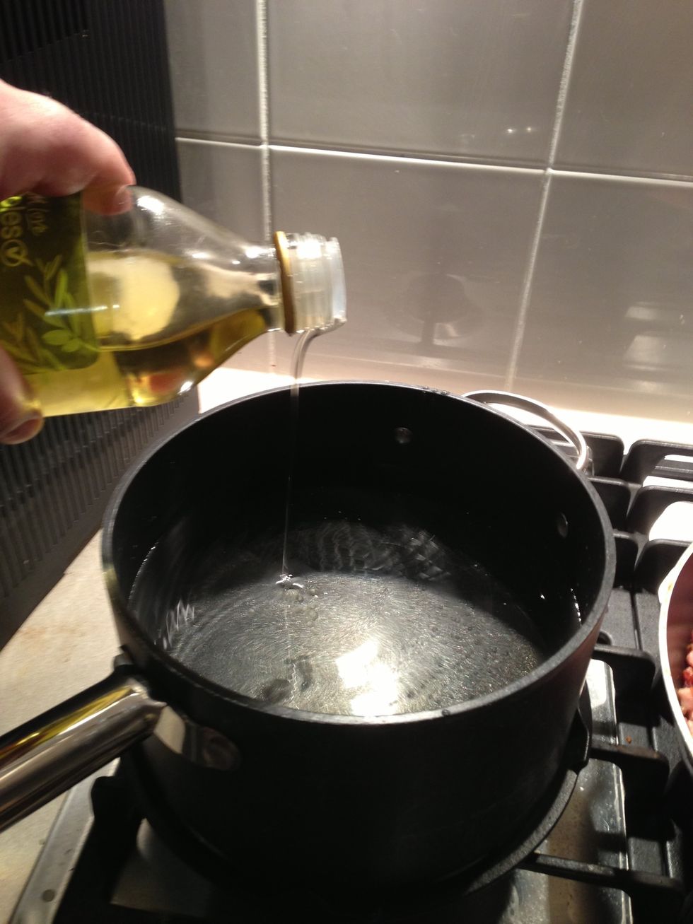 Pour in a small splash of olive oil or 1 teaspoon. It helps to keep the pasta from sticking together