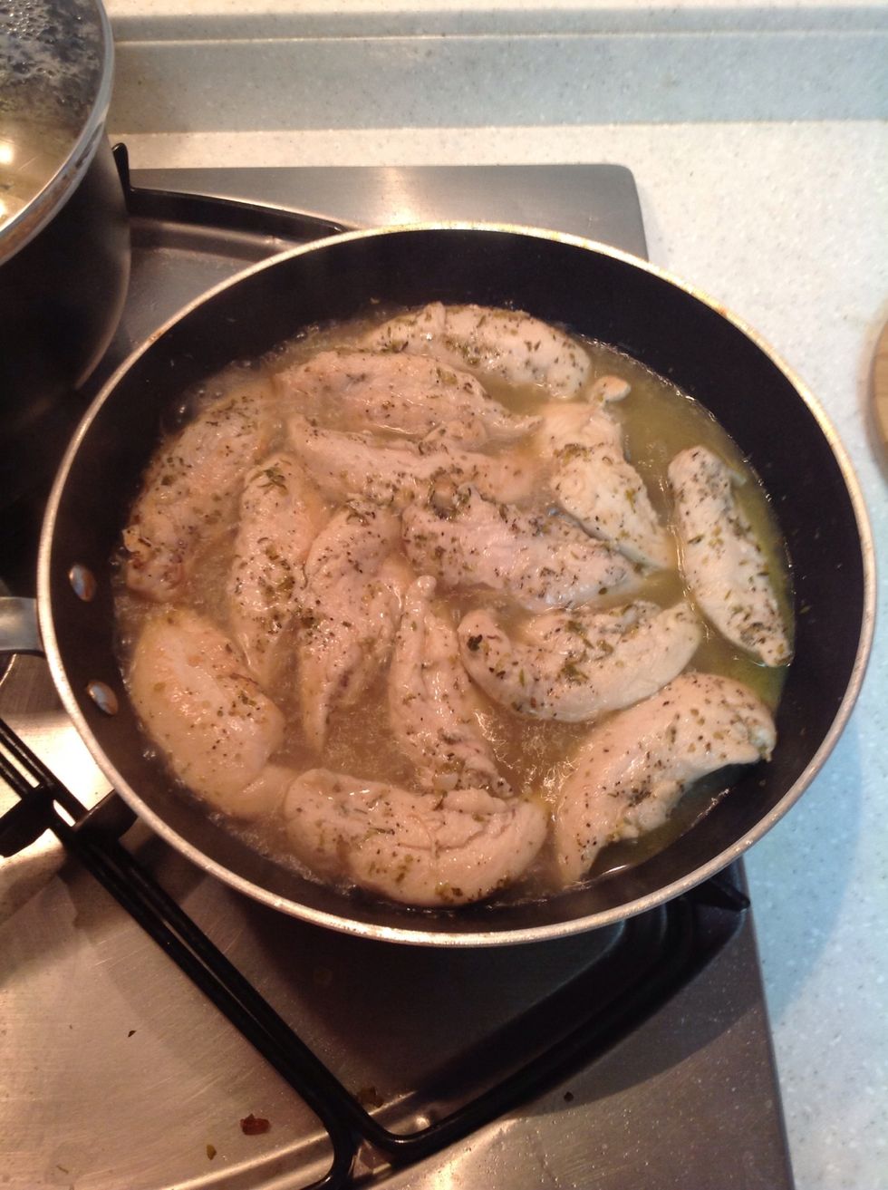 Pour in about 1/2 the can of chicken stock. Lower heat and let simmer (about 5-8 mins) until the majority of the liquid is gone.
