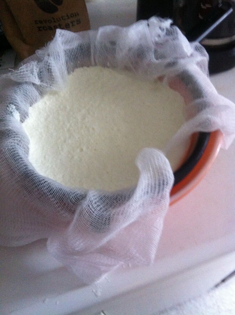 Pour in and let the whey separate from the curds